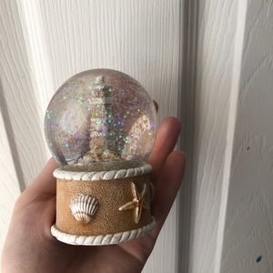 beach themed lighthouse snow globe